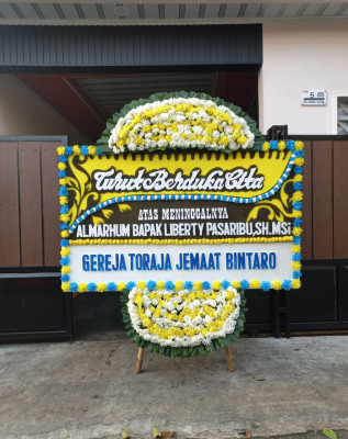 Papan Bunga Duka di Wedung
